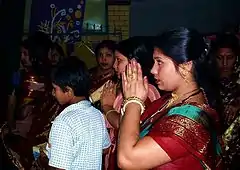 A Bangladeshi woman participating in Durga Puja.