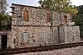 The old railway station of Dayr al-Shaykh, on the Jaffa–Jerusalem railway line, situated 0.5 km east of the village site.