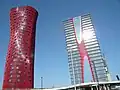 Hotel Porta Fira (left) in Barcelona, Spain, by Toyo Ito