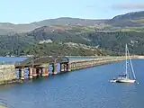 Barmouth railway viaduct, showing two steel spans providing access for marine traffic