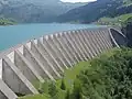 Buttresses and an arch of the Roselend Dam in France