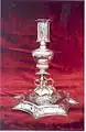 Sterling silver candlestick, One of a pair of candlesticks made for the 5th Earl of Bath's widow. Marks for silversmith Robert Cooper, London, and 1679. They bear the arms of the widow of the 5th Earl of Bath.