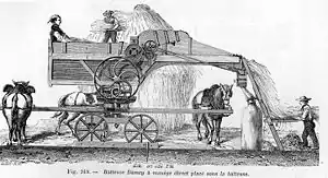 A horse-powered threshing machine.  The horse and harness nearest the viewer have been omitted to show the machinery.