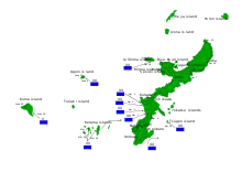 Map of a crescent-shaped island, with plans for four American divisions to land on its western shore