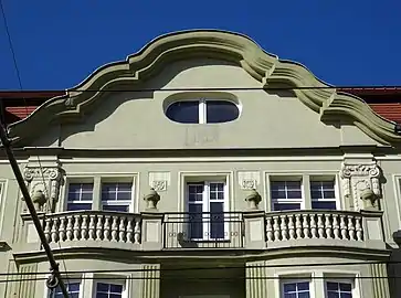 Balcony topping the bay window