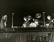 The Beatles performing at the Gator Bowl in 1964.