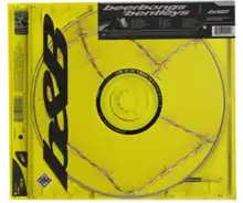 A disc wrapped in barbed wire inside a jewel case