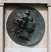 Medallion of Carl Michael Bellman, Bellmanskällan. Bronze