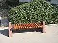 An open park bench in Tehran