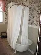 Bathtub with curtain at the Bernheimer House