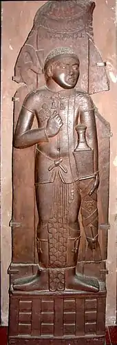 Indian relief of possible Indo-Greek king, with Buddhist triratana symbol on his sword