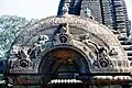 Detail of the Arched Gateway depicting two Apsaras resting on each side