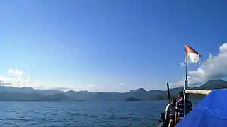 Traditional boats are popular among tourists on Prigi beach