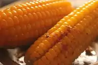 Boiled corn with chilli pickle