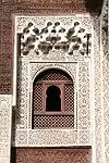 Muqarnas above a window in the Bou Inania Madrasa of Meknes