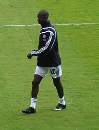 A man wearing a training kit.