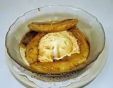 Bananas Foster, made from bananas and vanilla ice cream with a sauce made from butter, brown sugar, cinnamon, dark rum and banana liqueur