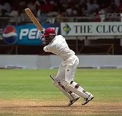 Brian Lara playing a stroke.