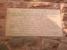 Inscription on Bridgnorth Museum, commemorating Sir Thomas Wolryche's deliberate destruction of the town in his defence of the castle against Parliamentary forces in 1646.