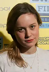 Brie Larson looks directly at the camera