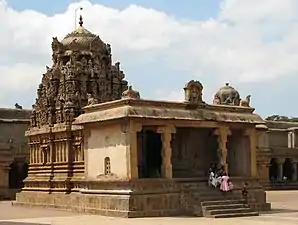 Separate Ganesha shrine with temple corridor in the back