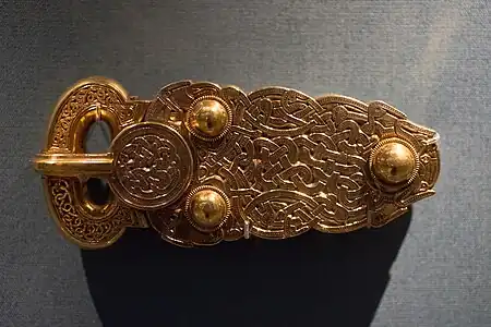 Anglo-Saxon belt buckle from Sutton Hoo with a niello interlace pattern, 7th century, gold, British Museum