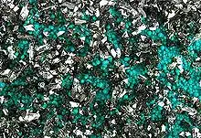 Brochantite on chrysocolla. Locality: Rokana Mine, Kitwe, Copperbelt Province, Zambia. Detail of larger specimen, field of view about 3 × 5 cm.