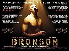 A muscular man, illuminated in sunlight and wearing boxing gloves, glances at the camera. The film's title is shown in golden bold text at the bottom of the image and various critic's reviews are displayed around the image.