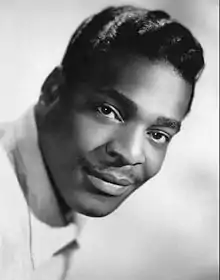 A black-and-white headshot of singer Brook Benton.