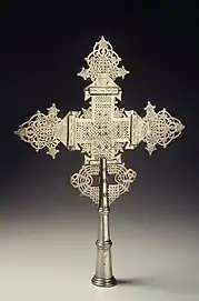 Brass, latticework processional cross (socketed for staff) from Amhara Region, mid 20th century.