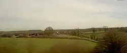 view of Burton-le-coggles from the train