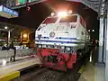 CC20302 locomotive train arriving at Bandung Station with the logo of Ministry of Transportation