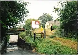 A gated village Barrow Crossing/foot crossing in Caersws in 2010.