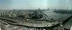 The 6th October Bridge, ramps, and Nile; with Downtown Cairo and Egyptian Museum (on left), in view north from Ramses Hilton