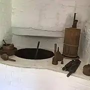 Stand-kettle, located in the west room to the right of the rear of the oven.  It can be heated from below.