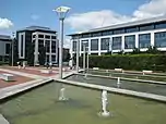 Modern office block c.2000, with water feature in foreground