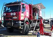 A rally support truck, with competition number 624 visible