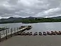 Some canoes and a dock at the edge of Derwent Water