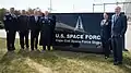 Lt. Gen. Nina Armagno, Rep. Bill Keating, Lt. Col. Timothy “Vax” Sheehan, and other dignitaries including Walter Taylor and Greg Moore attend the installation's redesignation as a Space Force Station.