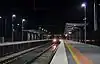 A train arriving at the new illuminated platforms at Cardinia Road station in the early morning