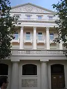 The terrace seen from the south, with the squat Doric columns at ground level and the Corinthian columns and pediment above