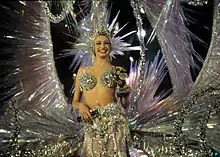 Smiling young woman in Carnival Queen costume