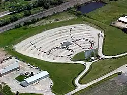 Cars in a "66" formation at the SkyView Drive-In