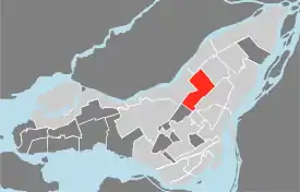 Location of Villeray–Saint-Michel–Parc-Extension on the Island of Montreal.  (Grey areas indicate demerged municipalities).