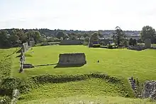 A train passes Berkhamsted castle, on an embankment that was once part of the castle's outer defences