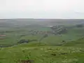 View of the village of Castleton from Mam Tor with Hope cement works in the background