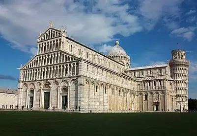 Pisa Cathedral showing polychrome, galleries, dome (completed later), and free-standing campanile