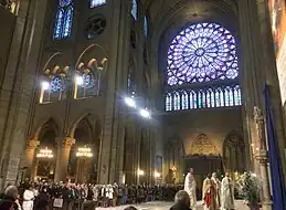 Rayonnant rose window of the north transept (1250s), Primary or Early Gothic tribune windows (before 1190), one Classic or High Gothic clerestory (c. 1200)