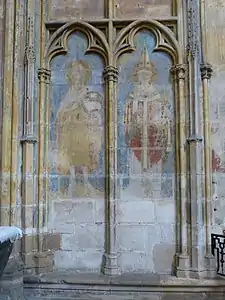 Traces of colored wall paintings; John the Baptist (left) and a Bishop