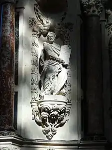 Detail of the retable; Saint Luke with a bull